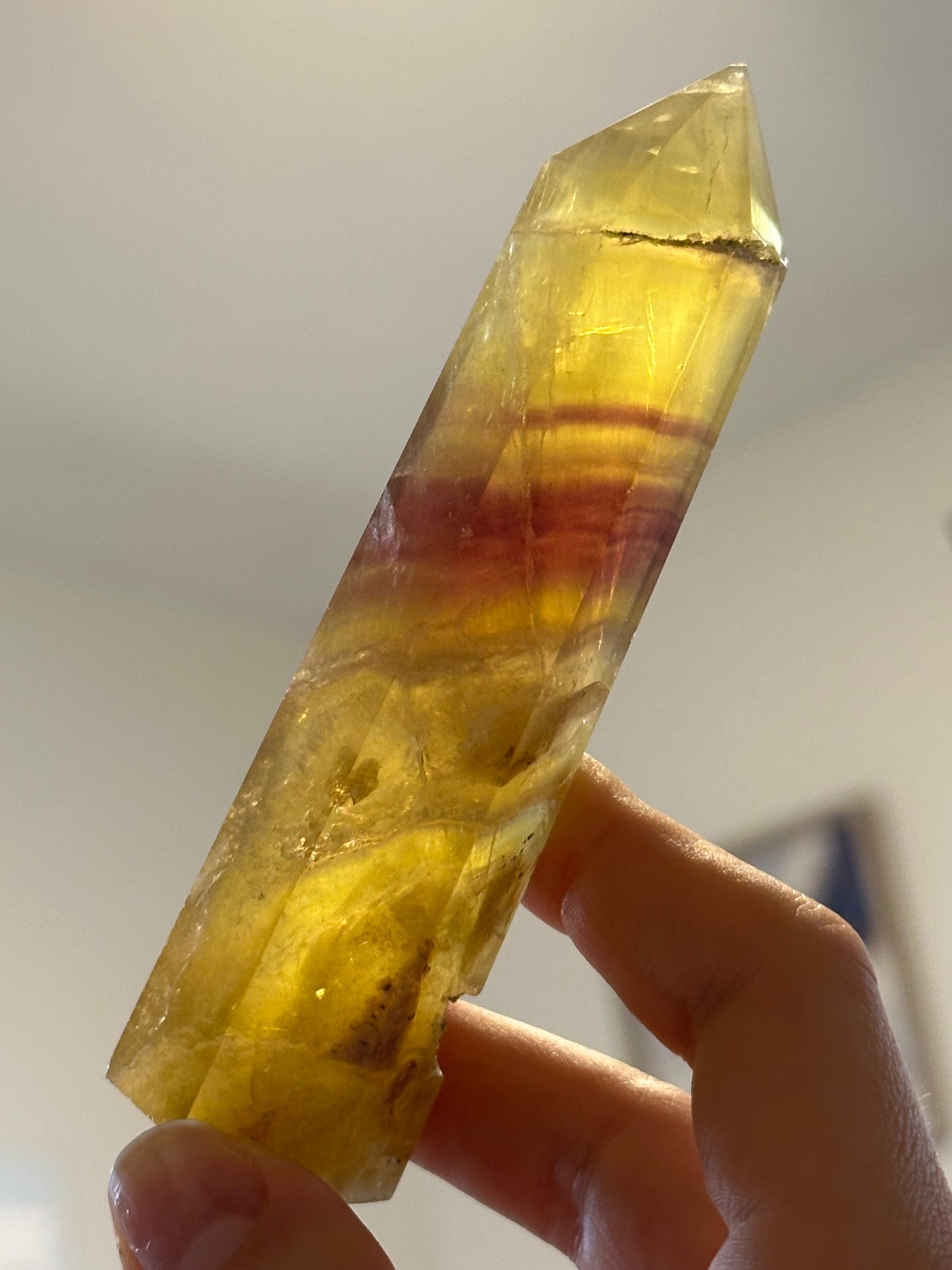 Yellow fluorite tower with magenta