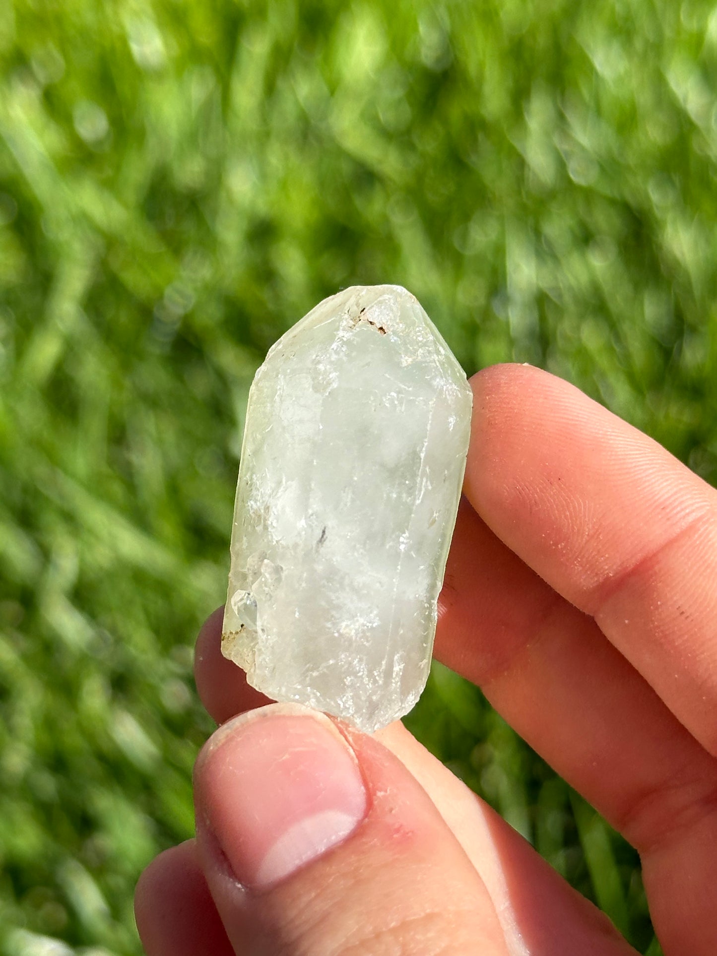 Epidote dust on quartz