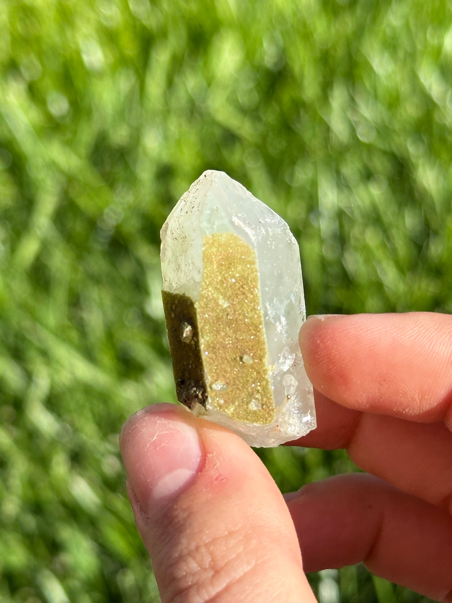 Epidote dust on quartz