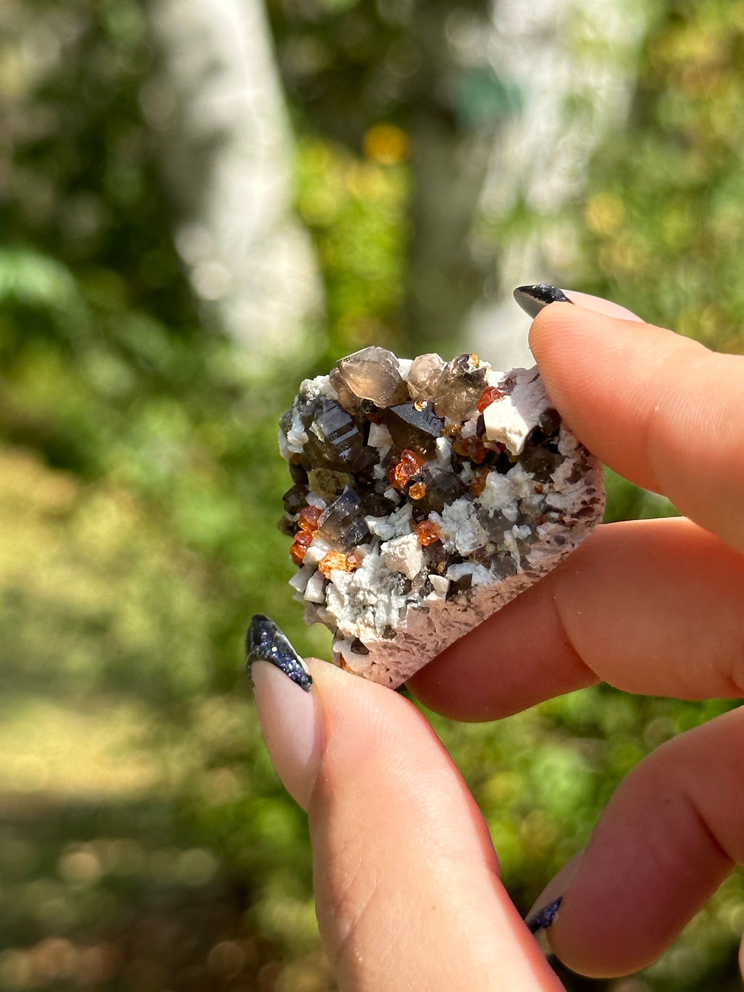 Spessartine Garnet and Smokey Quartz on Feldspar