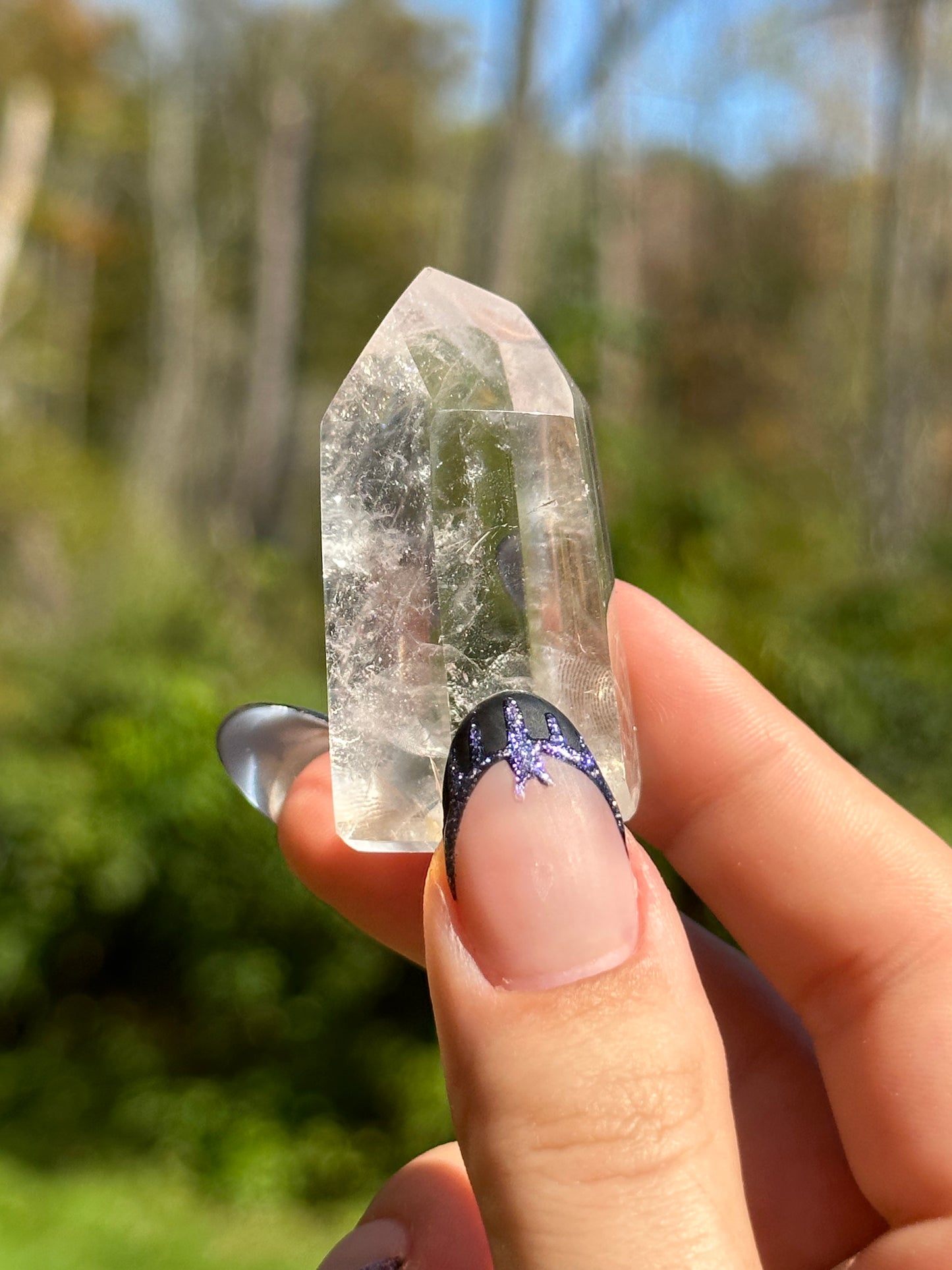 Clear Quartz point with phantoms