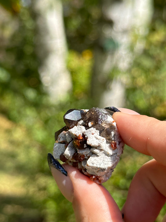 Spessartine Garnet and Smokey Quartz on Feldspar