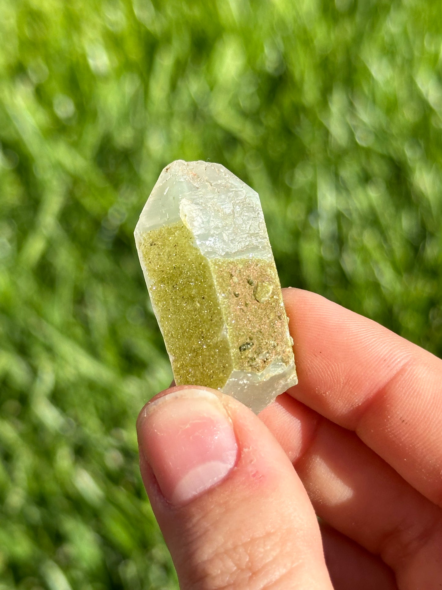 Epidote dust on quartz