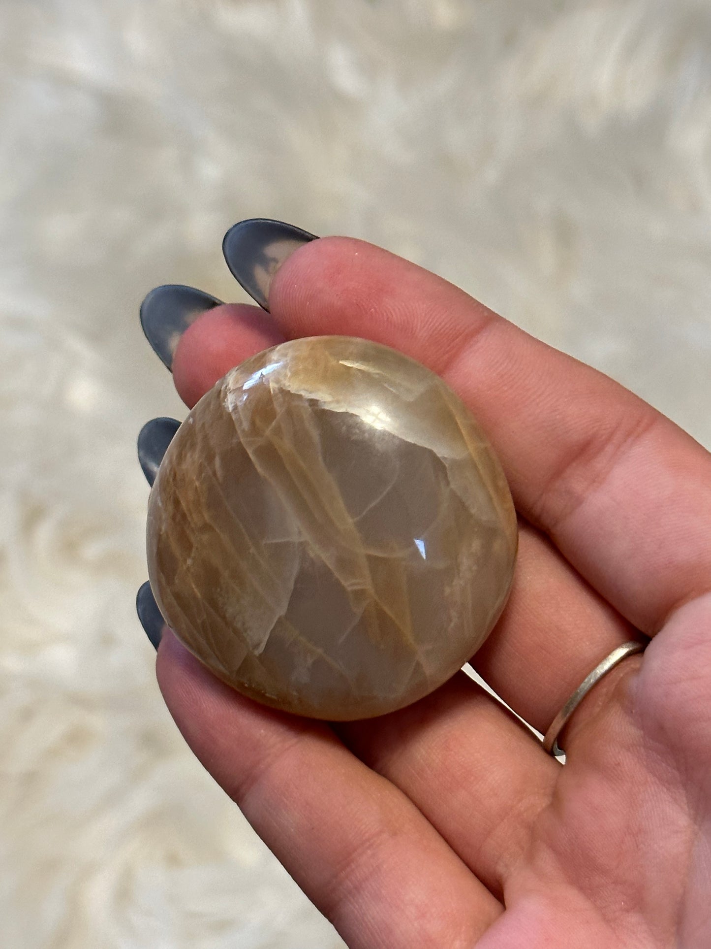 Flashy peach moonstone palmstone
