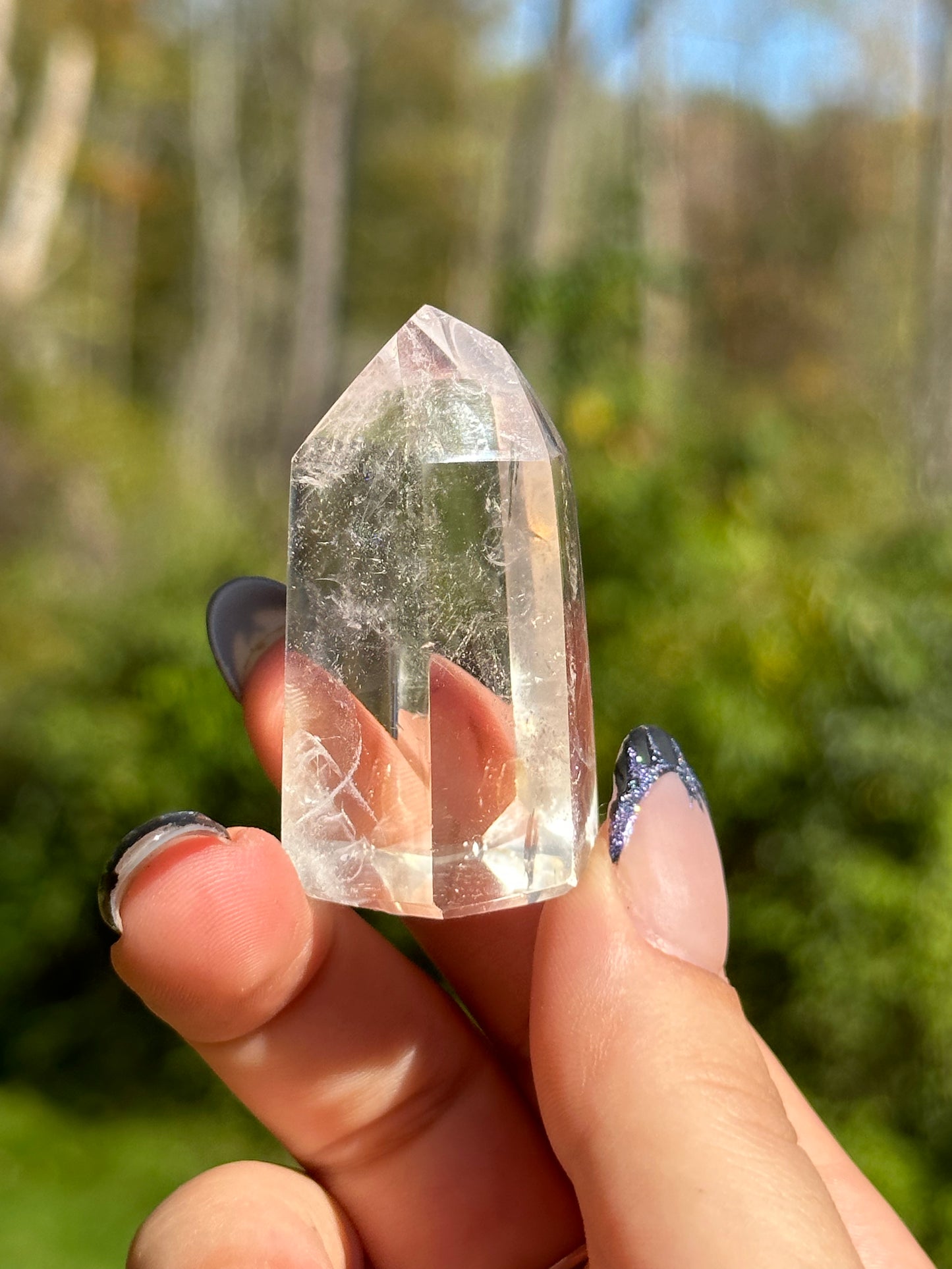 Clear Quartz point with phantoms