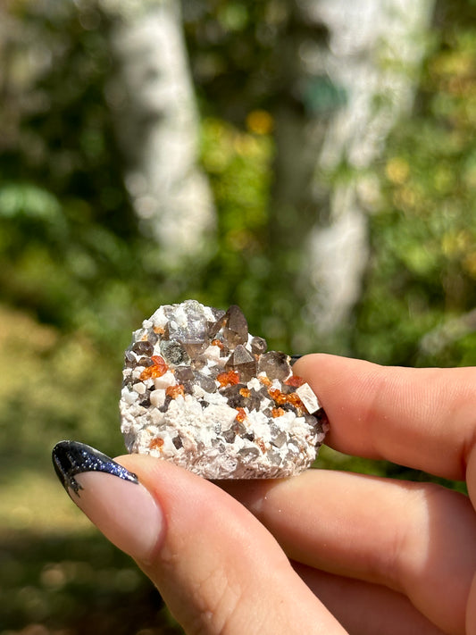 Spessartine Garnet and Smokey Quartz on Feldspar