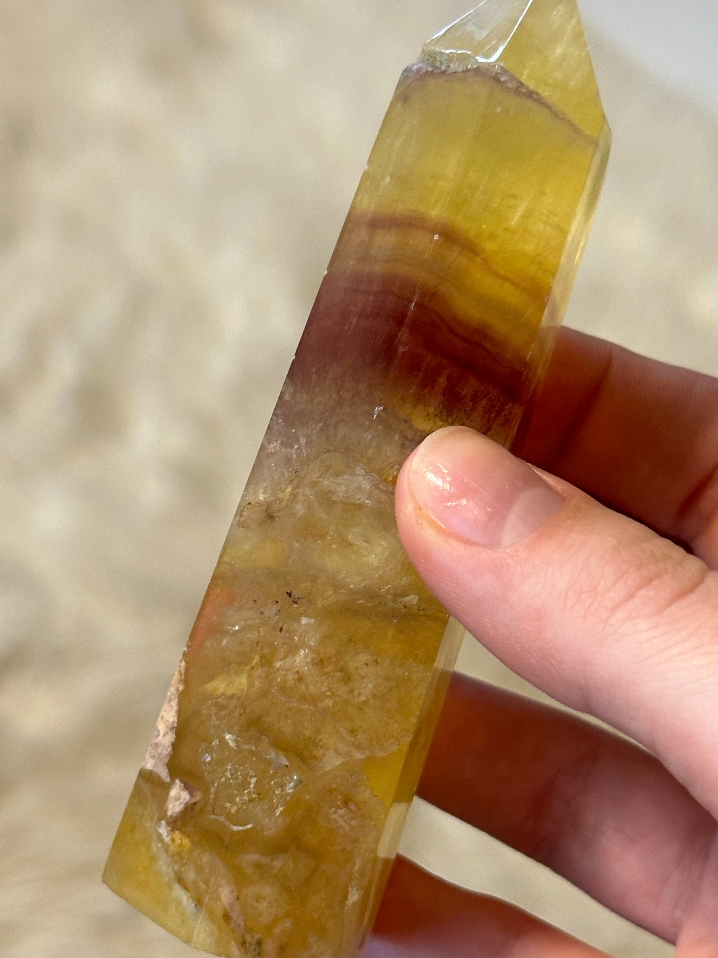 Yellow fluorite tower with magenta