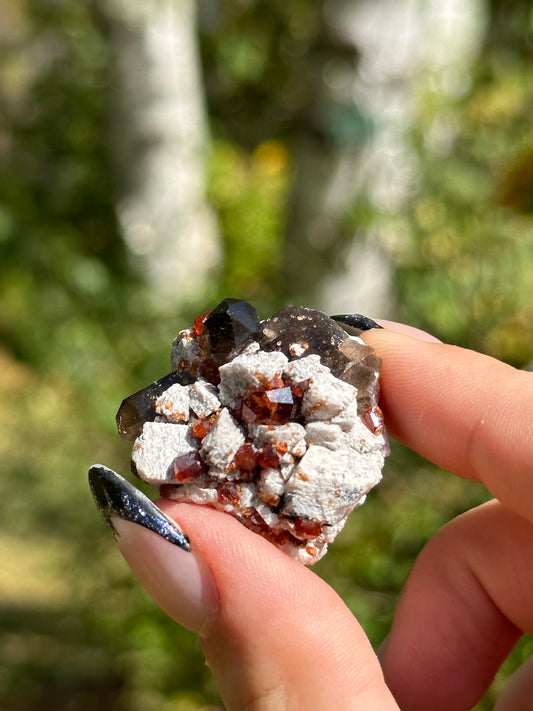 Spessartine Garnet and Smokey Quartz on Feldspar