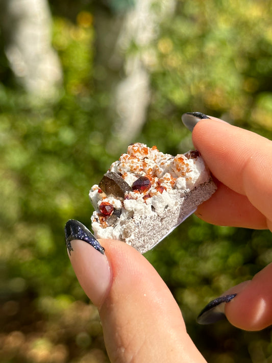 Spessartine Garnet and Smokey Quart on Feldspar