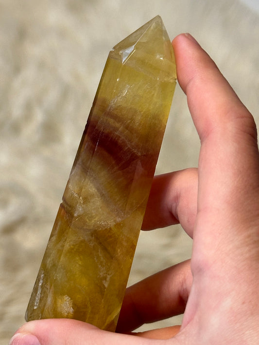 Yellow fluorite tower with magenta