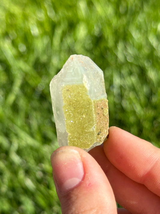 Epidote dust on quartz