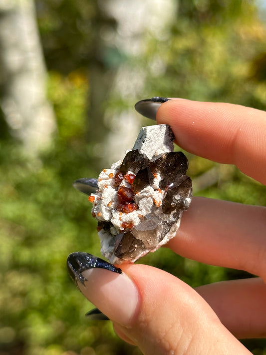 Spessartine Garnet and Smokey Quartz on Feldspar