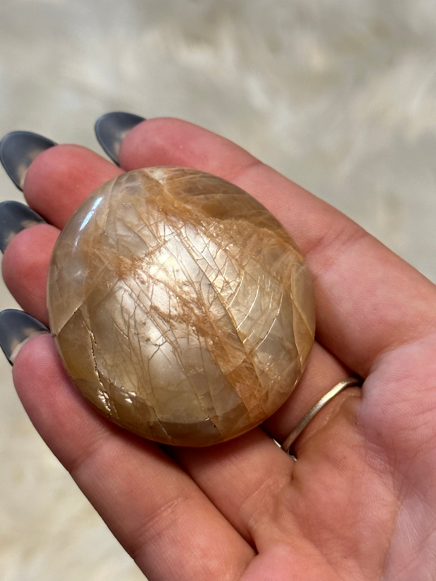 Flashy moonstone palmstone