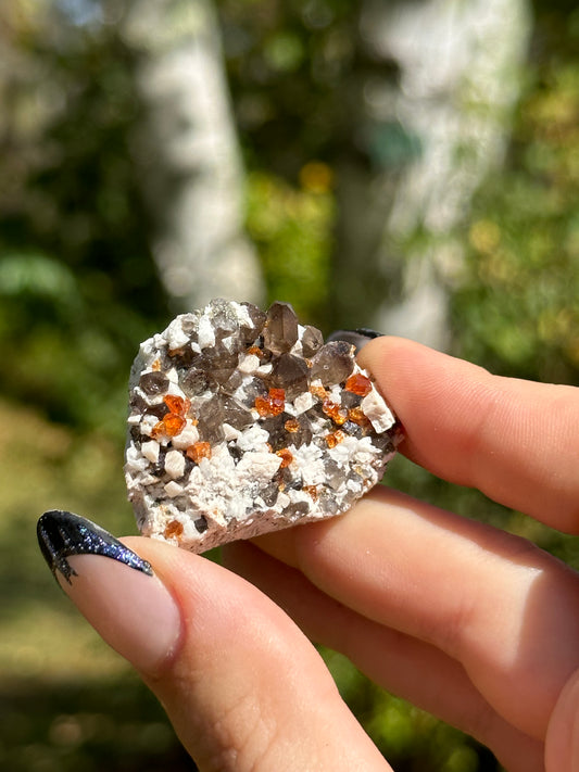 Spessartine Garnet and Smokey Quartz on Feldspar