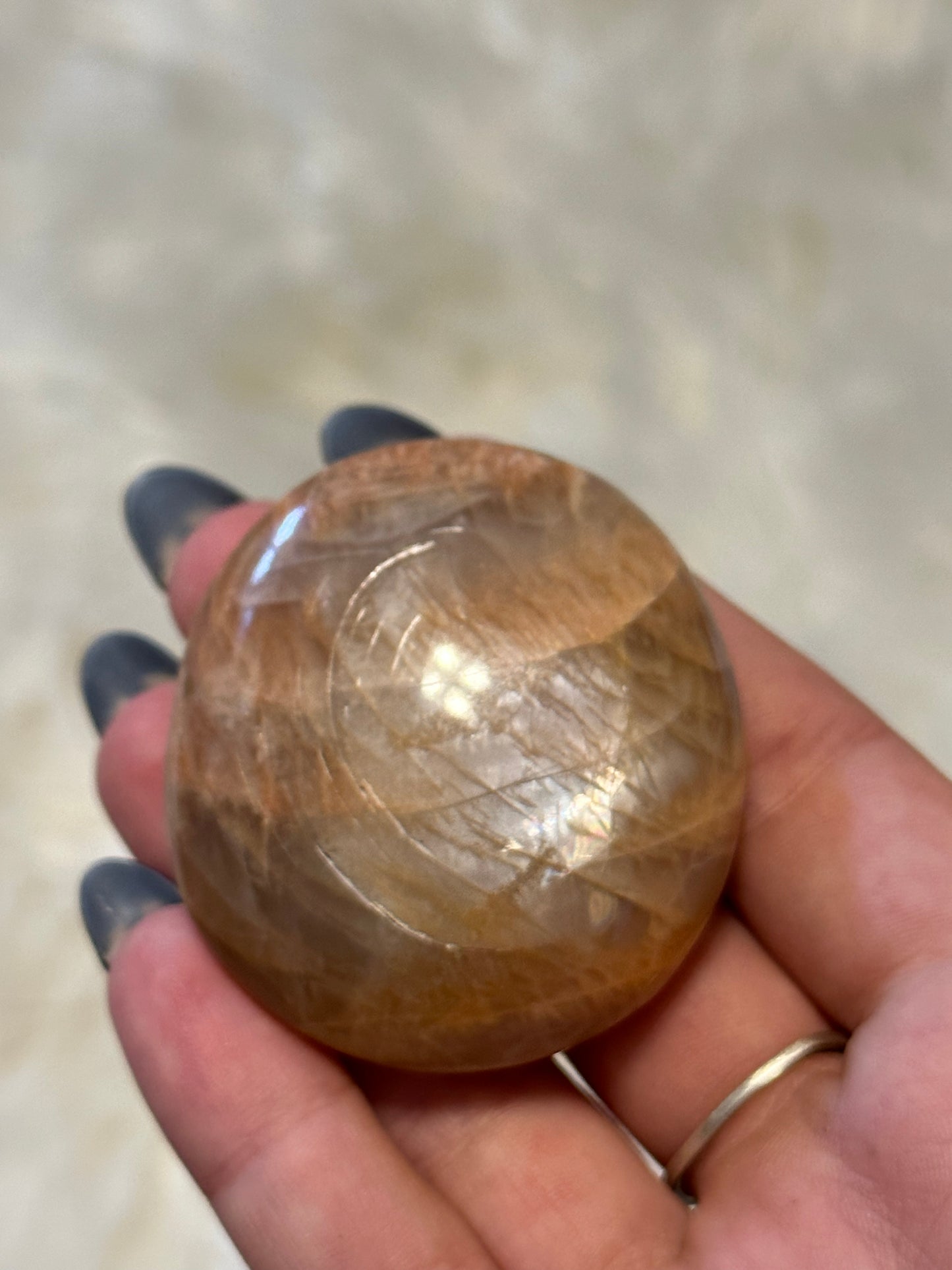 Flashy peach moonstone palmstone