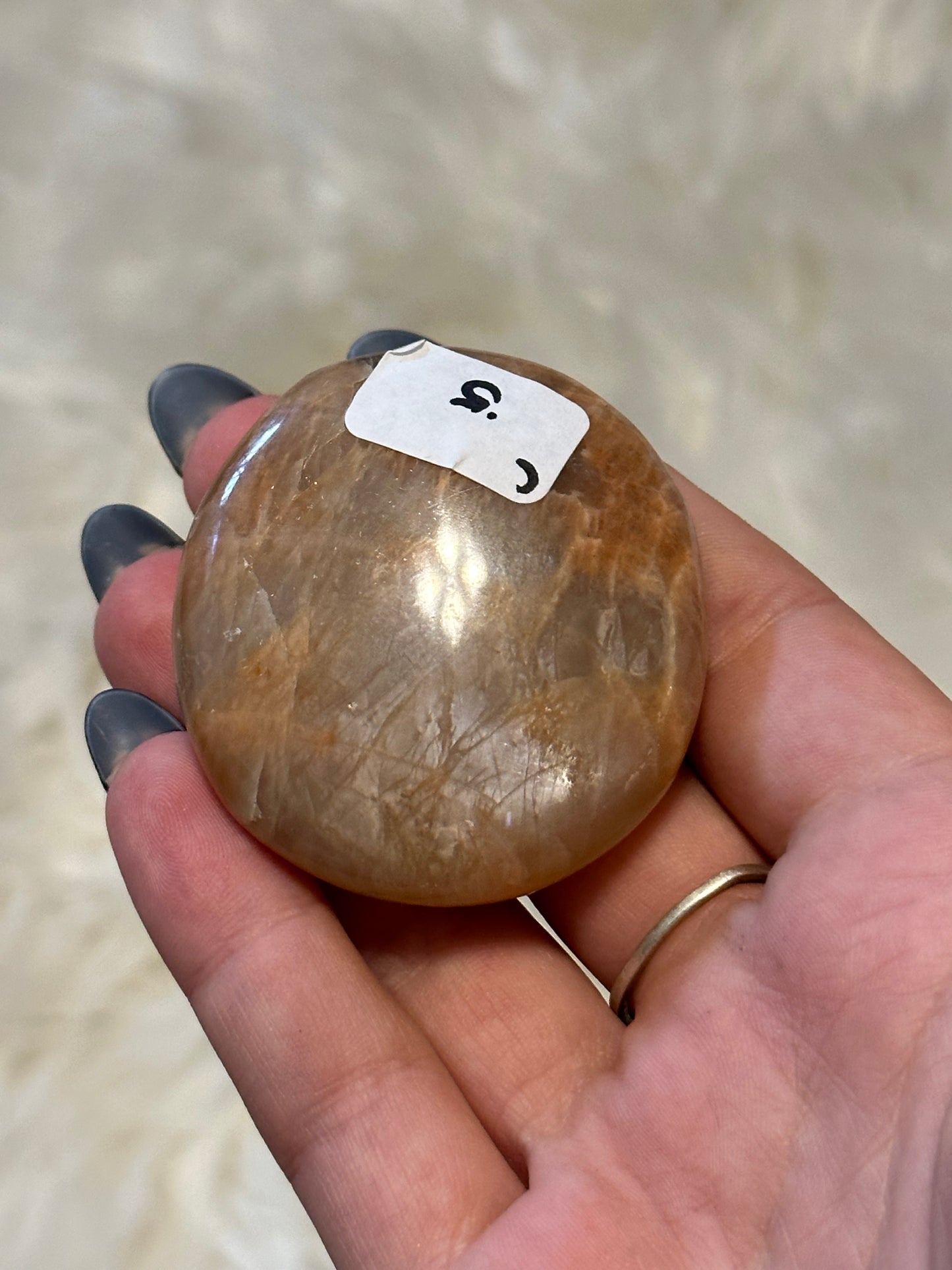 Flashy peach moonstone palmstone