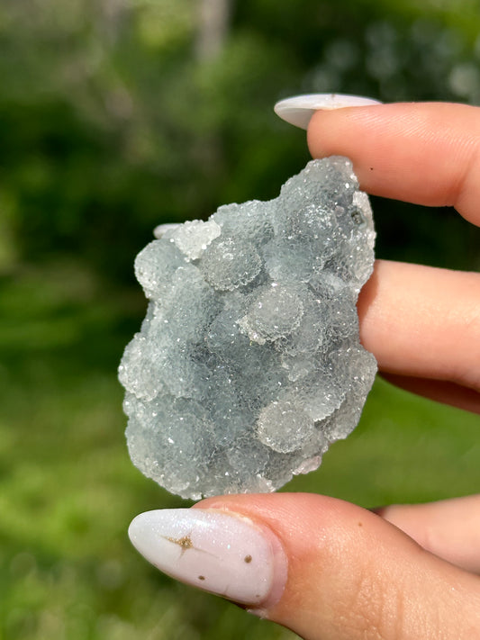 Black chalcedony with gemmy apophyllite - N