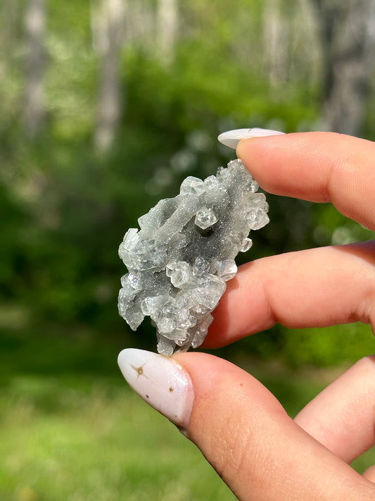 Black chalcedony with gemmy apophyllite - A