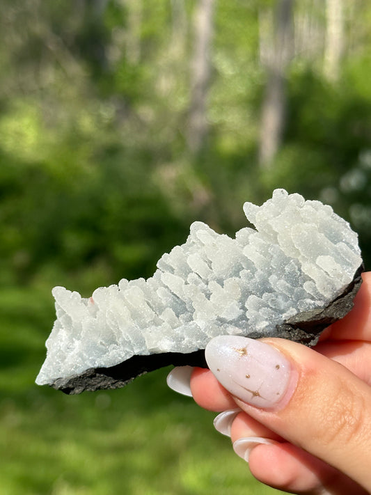 Black chalcedony with gemmy apophyllite - K