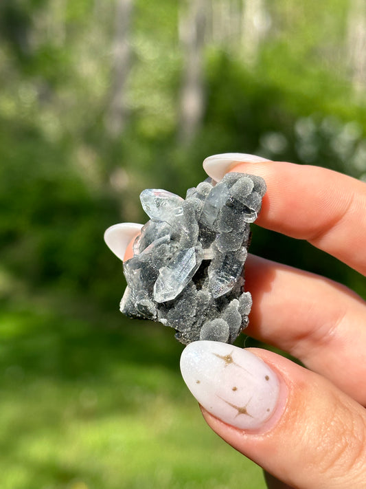 Black chalcedony with gemmy apophyllite -E